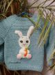 Ръчно изплетена детска блузка с апликация "Зайче с морков"